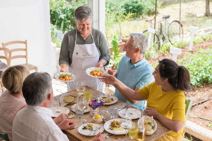 A farm-to-table MAKE TRAVEL MATTER Experience at Trattoria Terra Madre in Alberobello, Italy. TTC tour brands, make travel matter, trattoria