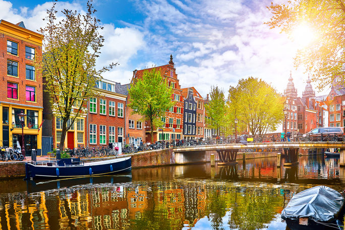 Historic buildings and channel in Amsterdam's historic center. Historic buildings and channel in Amsterdam's historic center.